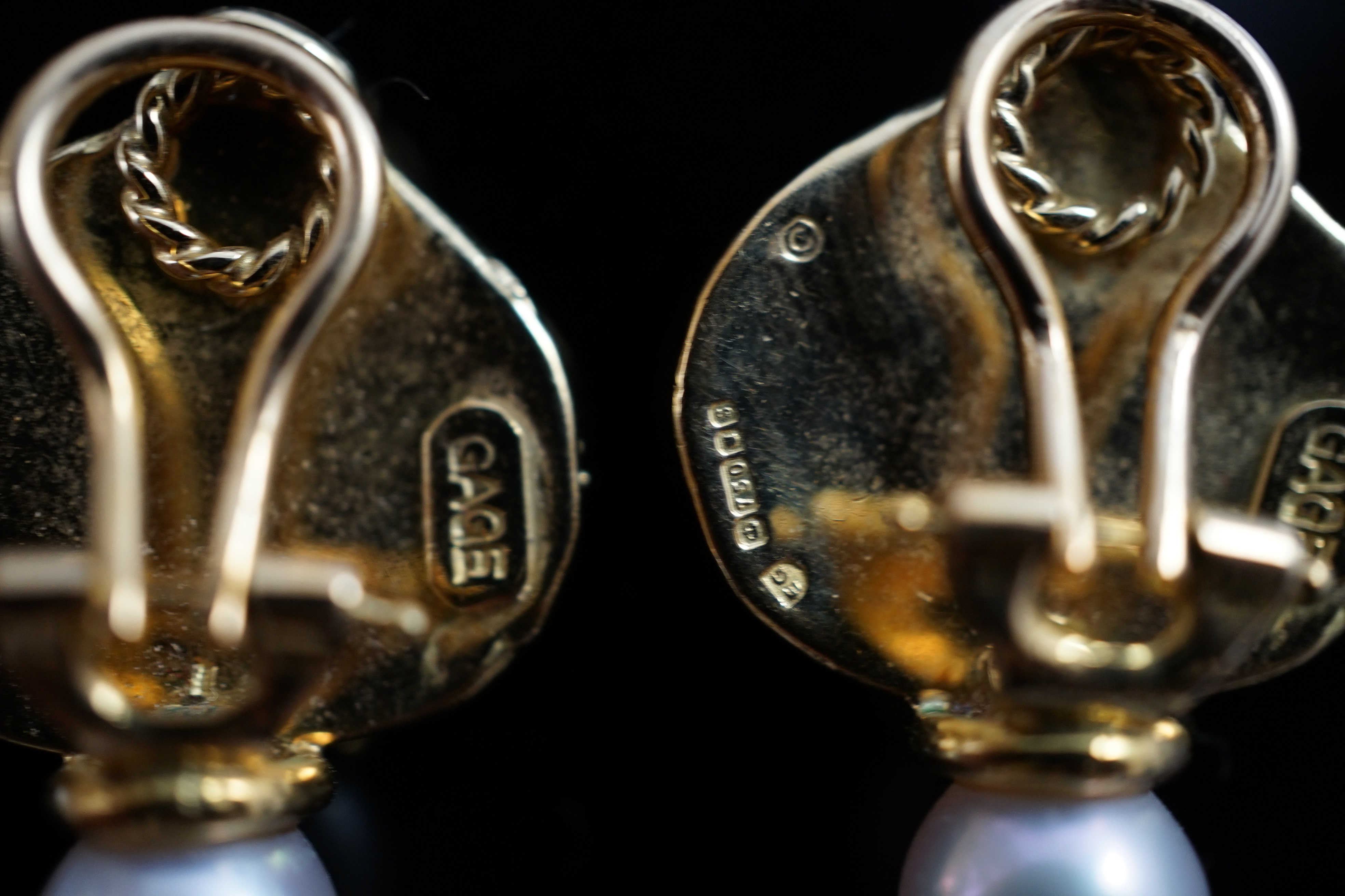 A pair of 1990's 18ct gold and cultured pearl set shiraz ear clips by Elizabeth Gage
